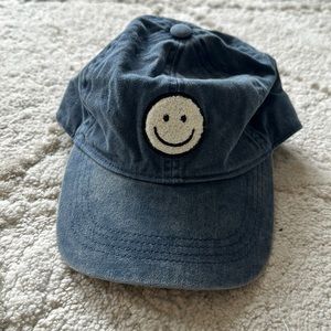 Blue smiley face baseball hat